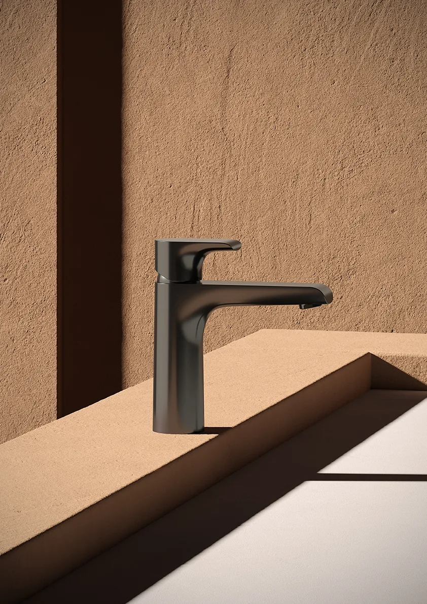 Basin mixer on a sand coloured top