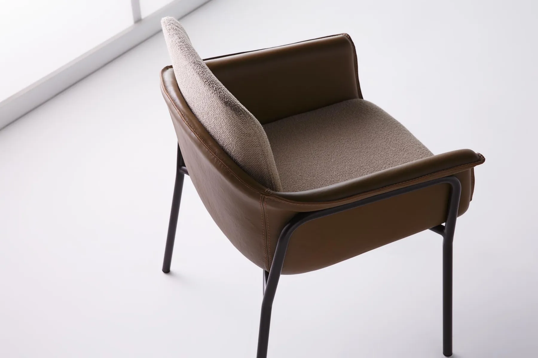 OMG chair from above, leather shell and fabric back